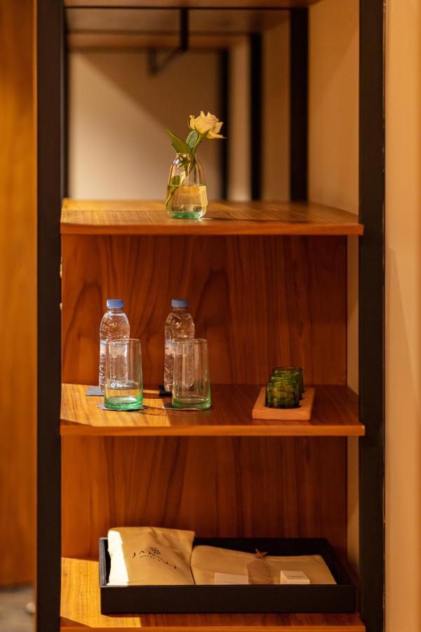 Hotel Jadali & Spa Marrakesh Ngoại thất bức ảnh Bottled water in a hotel room