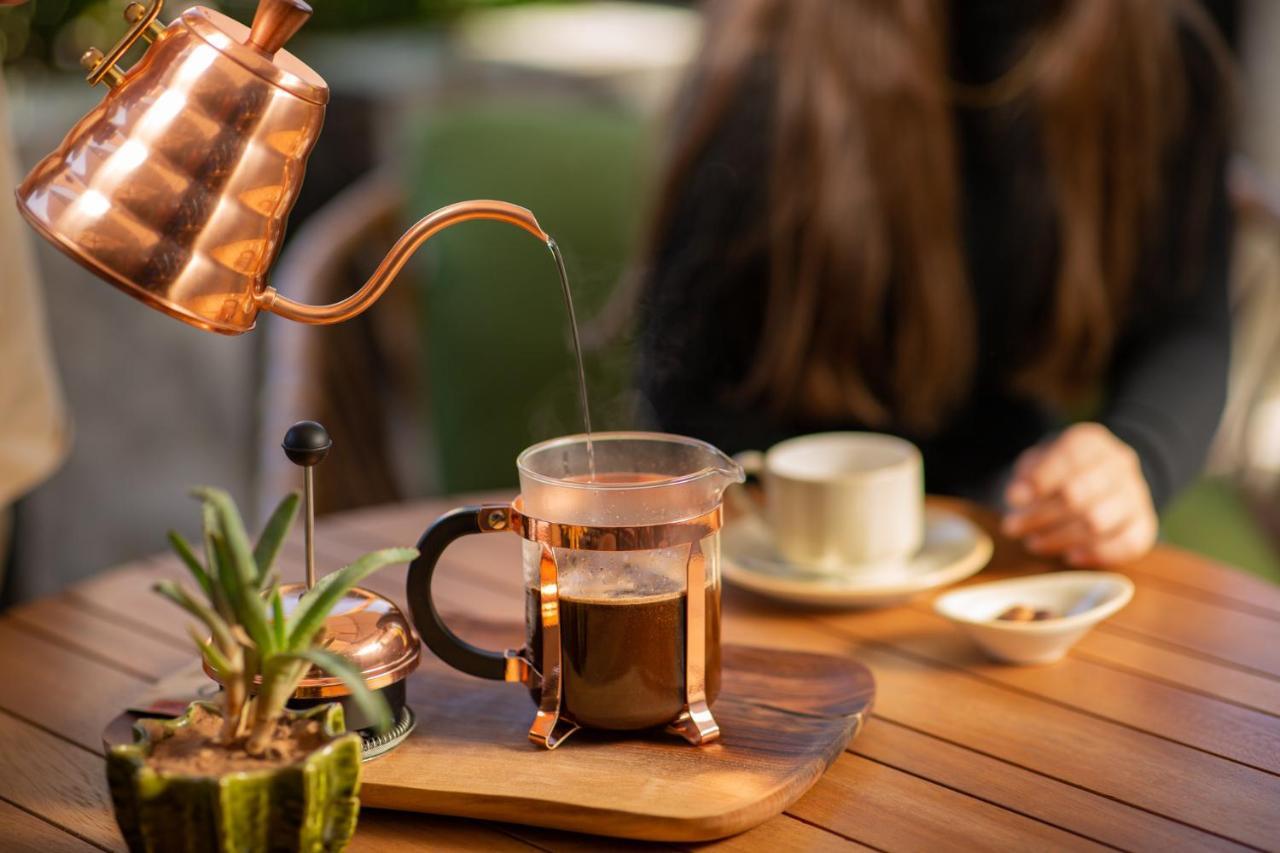 Hotel Jadali & Spa Marrakesh Ngoại thất bức ảnh A copper kettle and a glass cup