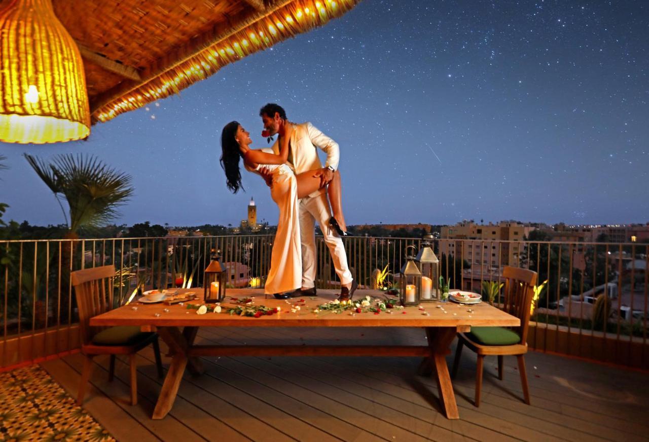 Hotel Jadali & Spa Marrakesh Ngoại thất bức ảnh A couple dancing on a rooftop
